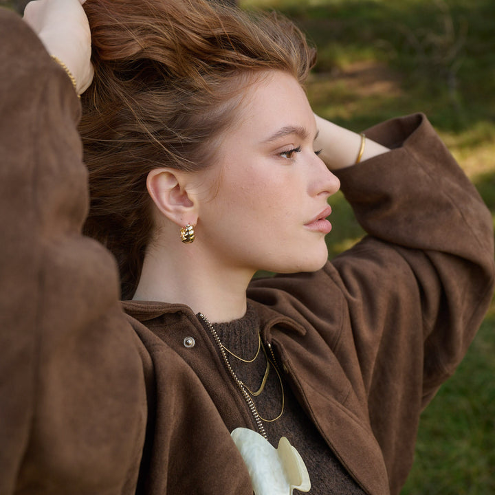 Naia - Orecchini a cerchio a forma di croissant in acciaio inossidabile