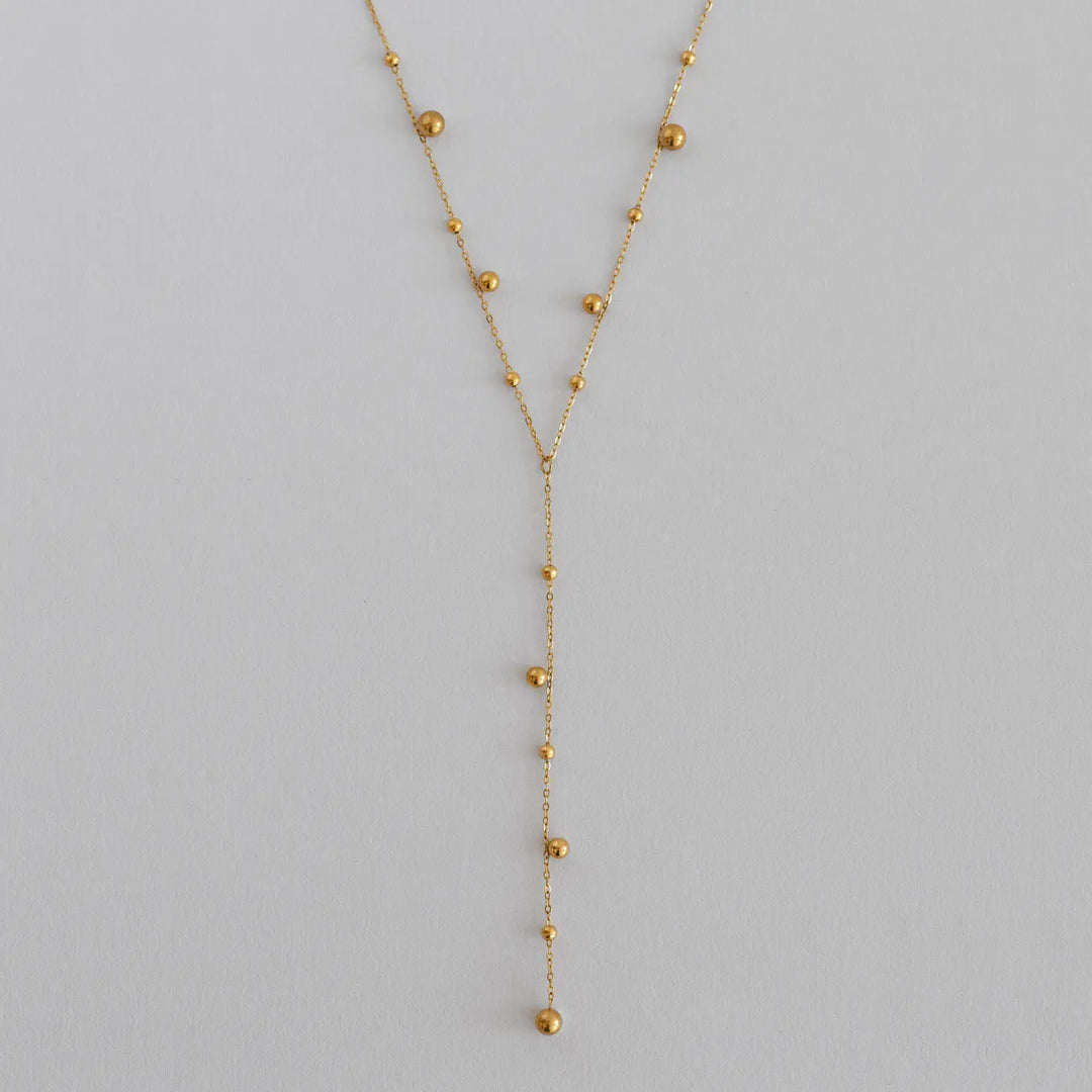 Klara - Lariat Necklace with Gold Dots Stainless Steel Timi of Sweden