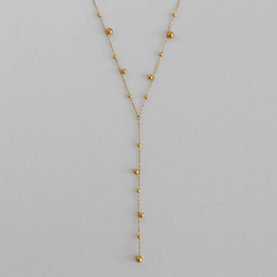 Klara - Collana Lariat con punti dorati in acciaio inossidabile