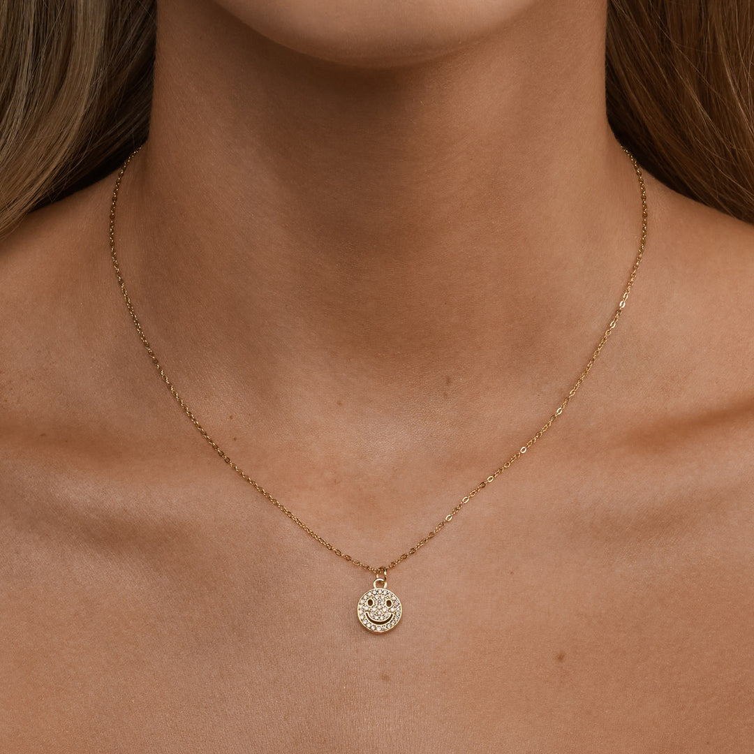 Lovely - Collana con ciondolo a faccina sorridente in oro