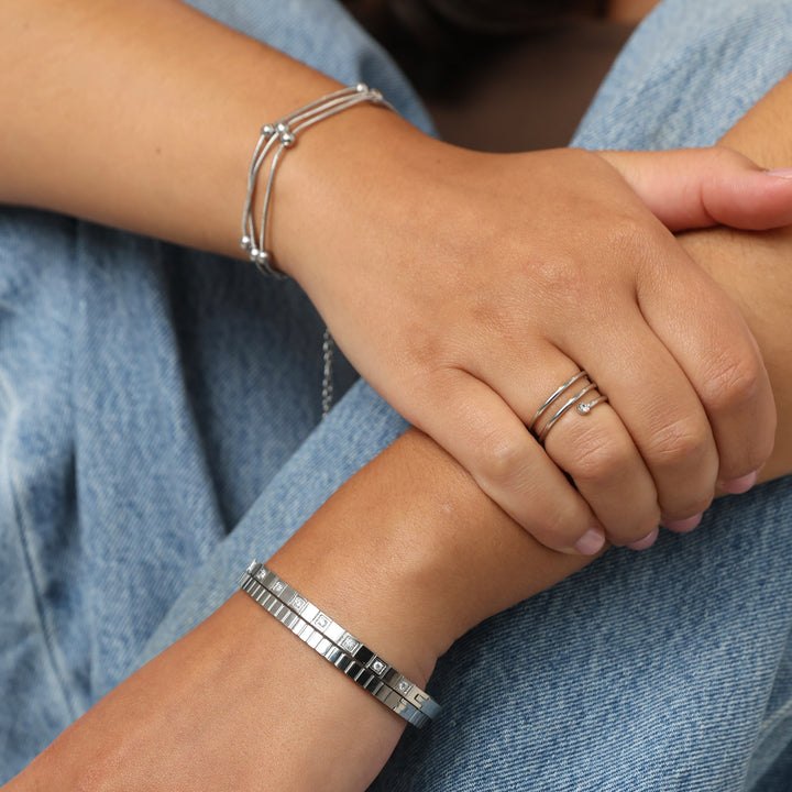 Meg - Bracciale rigido in cristallo in acciaio inox