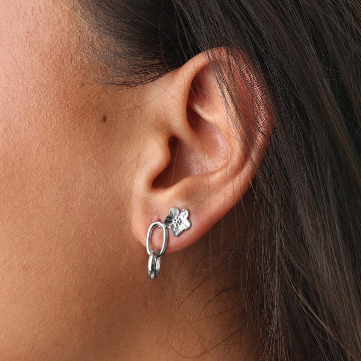 Sadia - Orecchini a bottone a fiore in acciaio inox