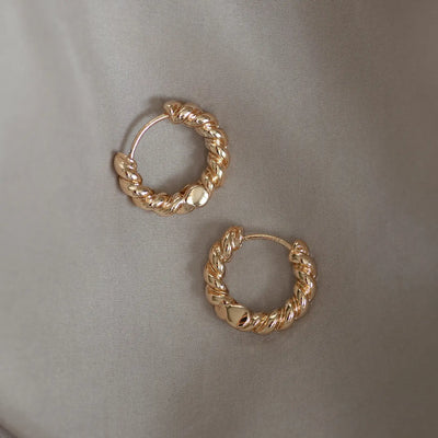 Orecchini a cerchio intrecciati - Oro