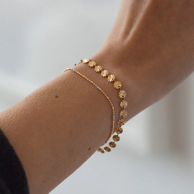 Bracciale piatto sole lucido